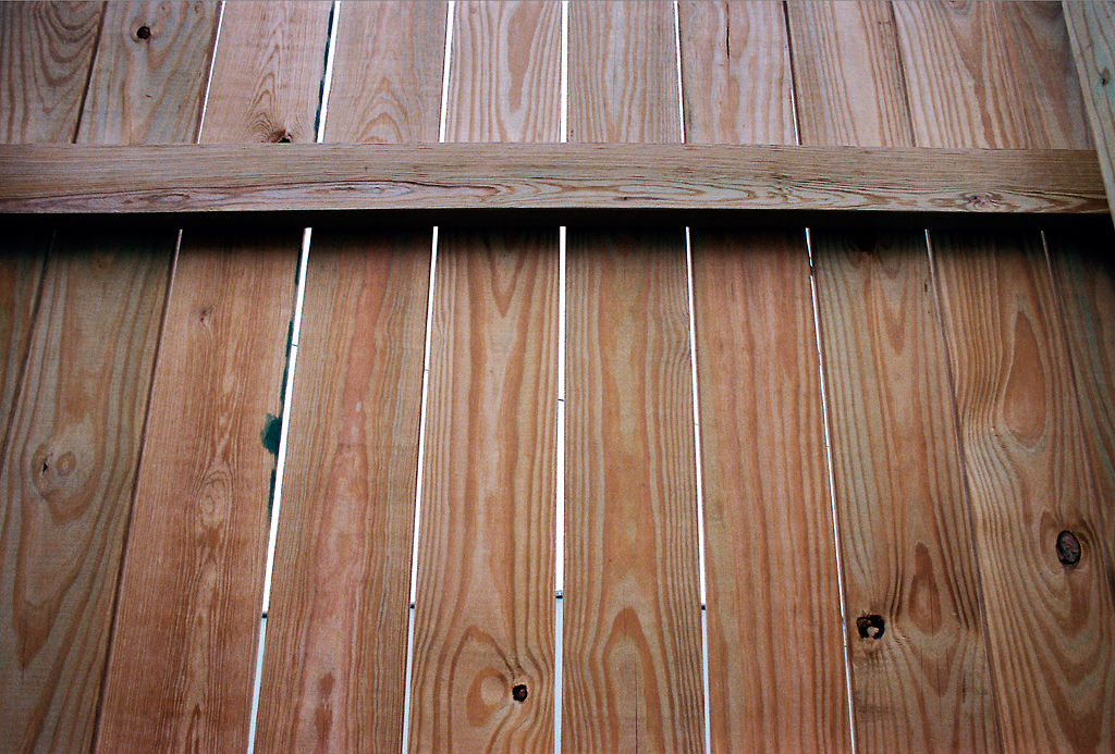An 8-foot tall fence protects the survivors